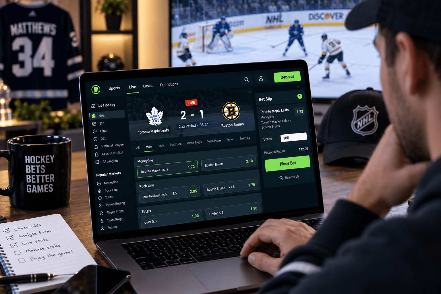 Person placing a live NHL bet on a laptop while watching an ice hockey game, with moneyline, puck line, totals, and betting odds displayed on screen.